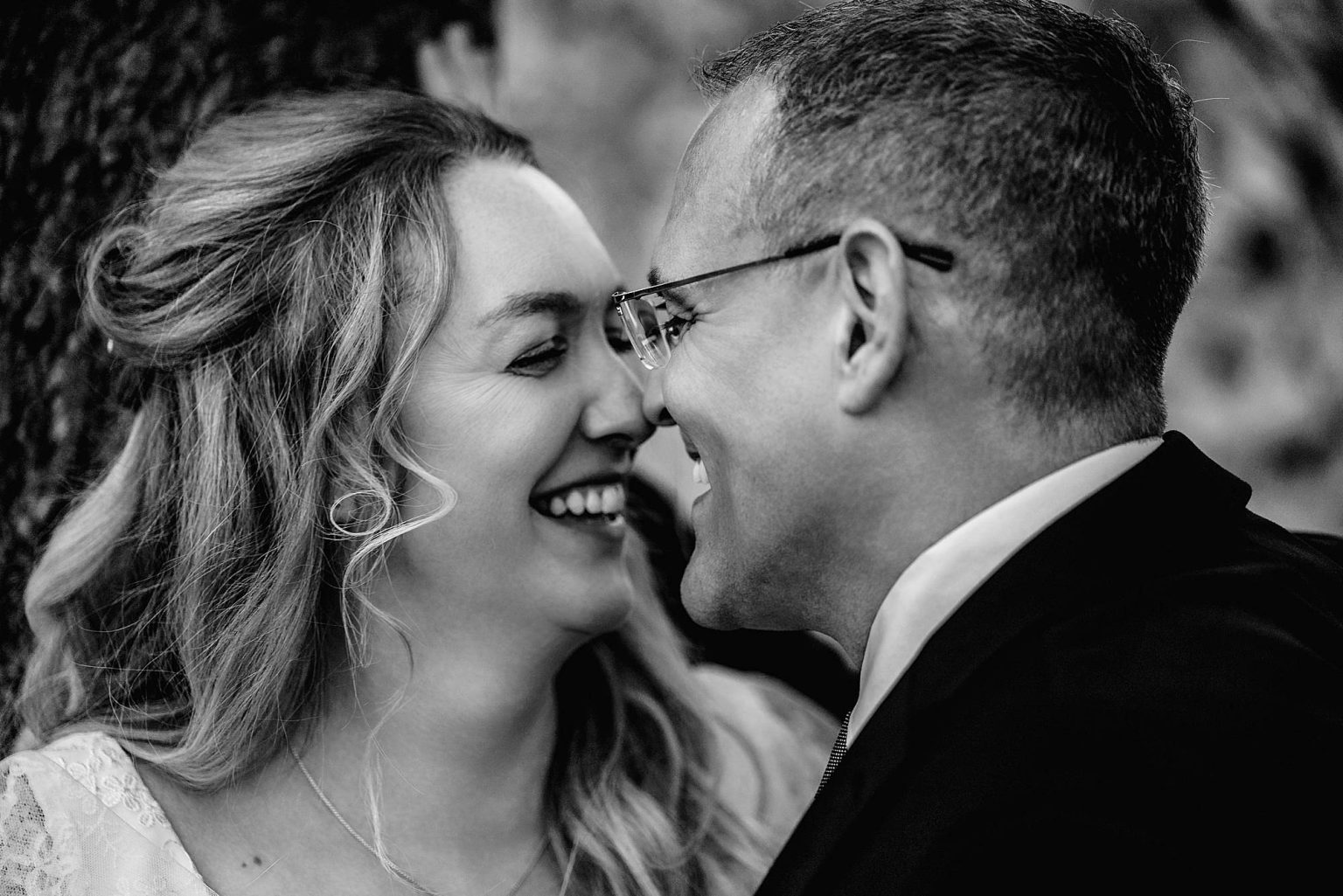 giggling bride and groom taken at the Orange Grove hotel