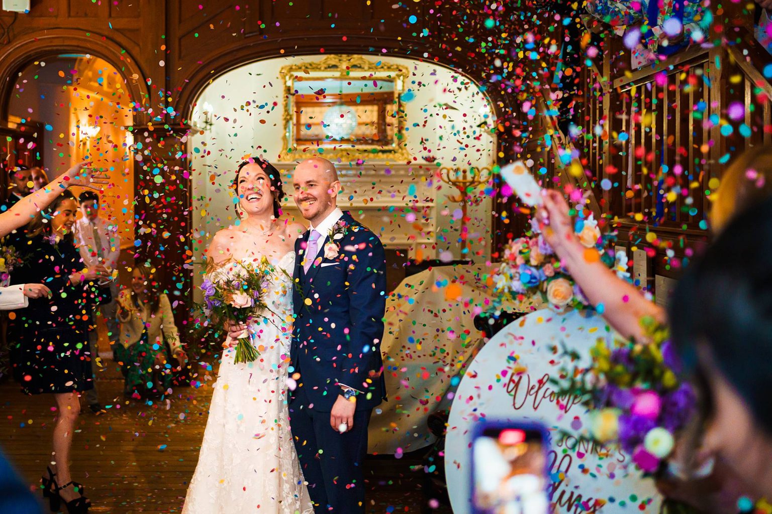 Fun wedding photography – indoor confetti moment